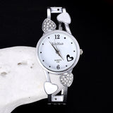 Britique women's diamond-set quartz watch with white dial, heart accents, and stainless steel pin buckle.